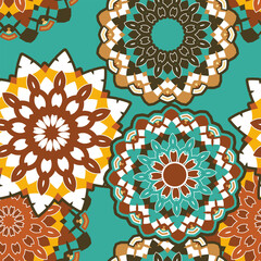 Seamless pattern with various round decorative elements. The palette is dominated by blue, brown and beige colors. Vector illustration