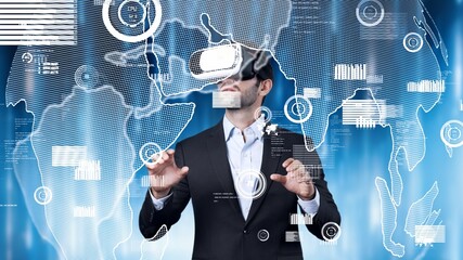 Skilled business man pointing and checking at global communication holographic. Smart project manager with VR glasses looking and connecting with global networking connection holographic. Apparatus.