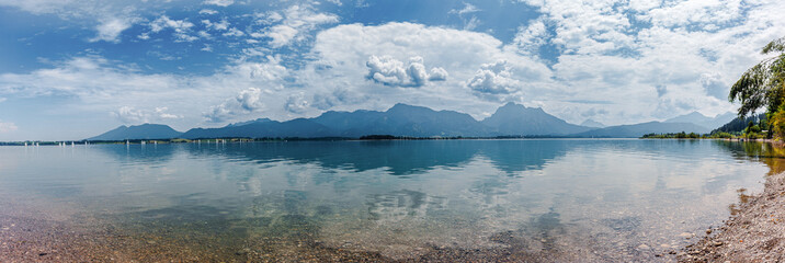 idyllic landscape view to Forggensee with Sailboats, Bavaria, Germany
