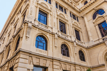 The building has a lot of windows and is very tall