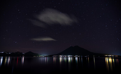Atitlan Lake in Guatemala. Long Exposure Night Photo Shoot. Volcano in Background. Lake Atitlan is the deepest lake in all of Central America with a maximum depth of about 340 meters or 1120 feet.