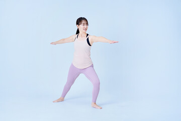 Obraz premium ヨガのポーズをする女性