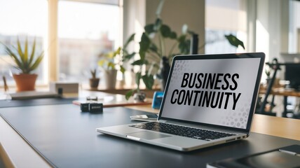 Business Continuity text displaying on an opened laptop on a desk in modern office. Problem solving, solution and intervention, stability failure concepts.