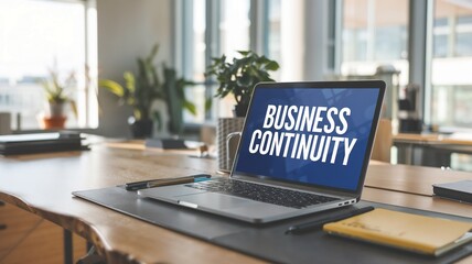 Business Continuity text displaying on an opened laptop on a desk in modern office. Problem solving, solution and intervention, stability failure concepts.