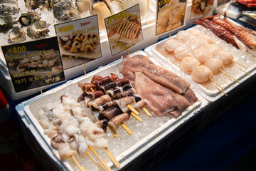 fresh squid and seafood in kuromon market, Osaka Japan