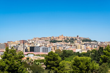 Cagliari In Sardinia, Italy. Cityview to the historic architecture, set against a clear blue sky during summer.