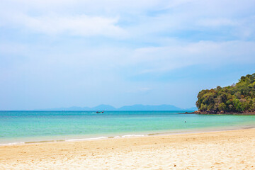 Seascape. Travel and tourism. Longtail boat in the sea sails to the island in Thailand