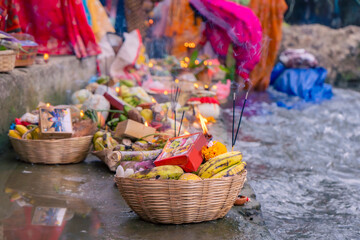 Chhath Puja Parwa Sun God Celebration with Fruits, Lights and Lamps in riverside in Nepal and India with lights, lamps diya after diwali
