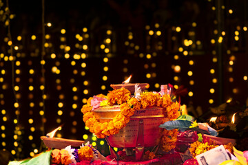 Chhath Puja Parwa Sun God Celebration with Fruits, Lights and Lamps in riverside in Nepal and India with lights, lamps diya after diwali