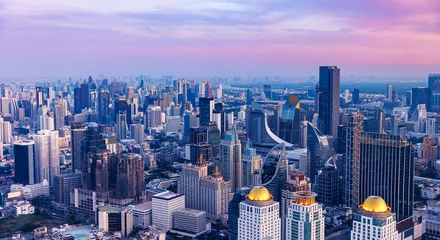 Fototapeten Lila Panorama sunset Bangkok city, aerial top view panorama, Thailand landscape from drone  © Parilov