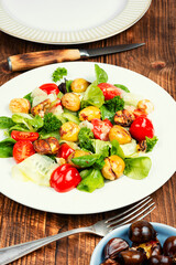 Vegan salad with roast chestnuts.