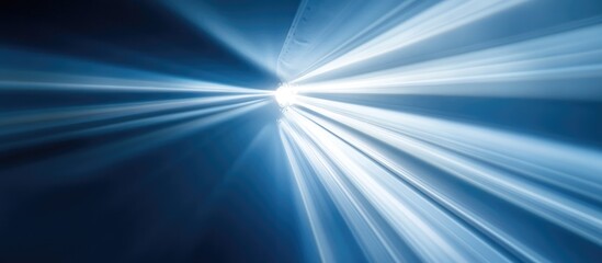 Radiant beams of light streaming through an airplane window creating a dramatic atmospheric effect in flight