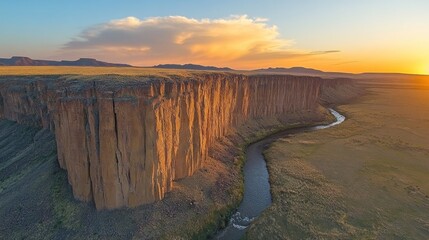 Majestic Sunset over a River and Cliff: A Breathtaking Landscape