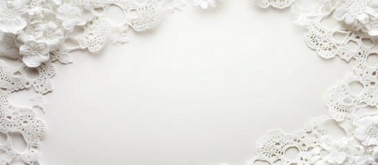 Elegant wedding invitation card design with a white lace background creating a romantic and sophisticated atmosphere for special occasions.