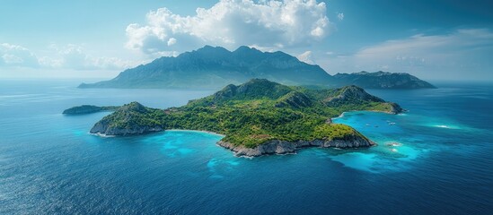Fototapeta premium Aerial view of breathtaking tropical islands with lush greenery and crystal clear waters under a vibrant blue sky