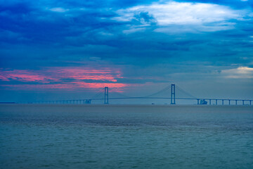 a cross-sea bridge in a cloudy morning