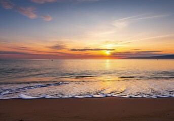 Obraz premium Serene Sunset Over Calm Ocean Waves on Sandy Beach