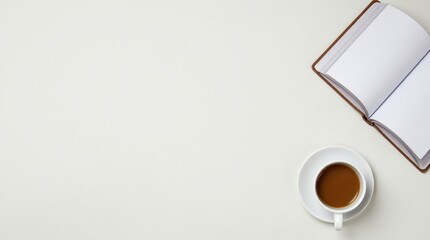 workspace with a coffee cup and an open book, representing a break from routine