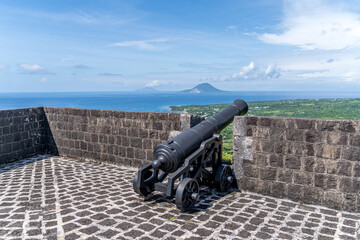 Brimstone Hill Fort citadel gun platform with cannons in St Kitts and Nevis with Oranjestad in the...