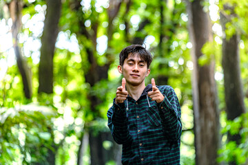 Handsome man standing and pointing at you. Young men challenge you to step outside
