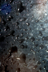 Close Up of Rain Drop Bubble Water on Glass Metal Background with Condensation
