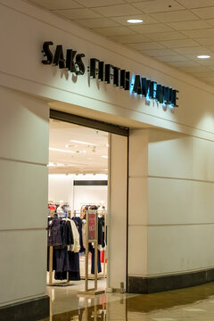 New Orleans, LA, USA - June 23, 2024: Entrance to Saks Fifth Avenue Store inside One Canal Place Shopping Center