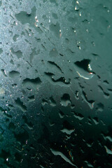 Close Up of Rain Drop Bubble Water on Glass Metal Background with Condensation
