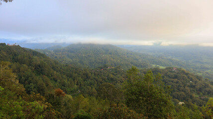 Fototapeta premium Natural landscape with fog and clouds in the morning