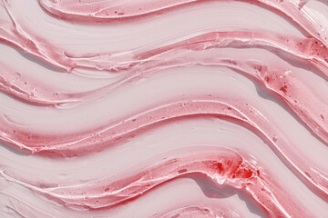 Cosmetic texture sample swatch red pink gel background