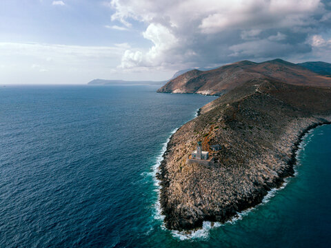 Aerial drone view of lighthouse on the rocky coastline of Cape Tainaron, Greece
