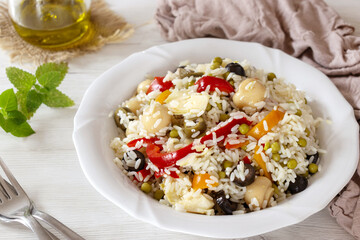 Italian Style Rice Salad on a white dish and light background