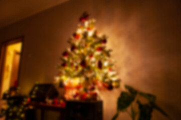 Blur Xmas backdrop. Abstract background with Christmas mood. Defocused blur color. Xmas winter holiday. Happy new 2025 year. Blurred Christmas background. Defocused abstraction. Tree decoration