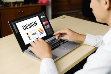 Graphic designer software for modern design of web page and commercial ads showing on the computer screen