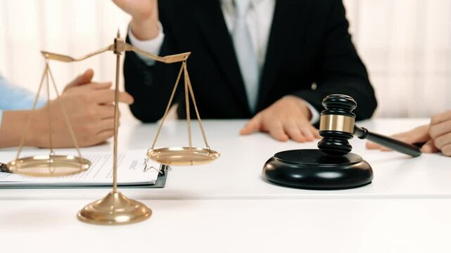 Lawyer act as mediator offer a compromise between two parties to resolve business dispute through negotiation at law firm office. Legal mediation and conflict resolution service. Slow motion. Rigid.
