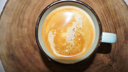 Cup of coffee on the wood background . High quality photo