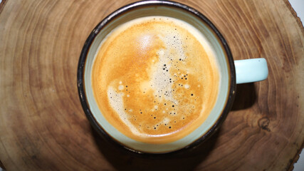 Cup of coffee on the wood background . High quality photo