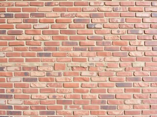 Obraz premium Rustic red brick wall texture with rough surface and natural color variations, textured