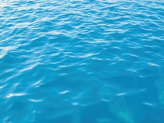 Obraz premium Rippled surface of blue water with gentle waves, waves
