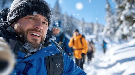 Fototapeta premium A group of hikers clad in vibrant winter gear traverse a challenging snowy landscape, demonstrating courage, resilience, and camaraderie in the face of nature's challenges.