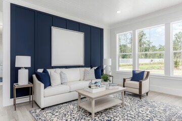 Fototapeta premium A warm living room with a freshly painted navy blue accent wall, paired with light furnishings and a patterned rug
