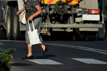 A pedestrian crossing a pedestrian crossing