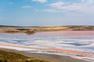 Koyashsky salt lake, pink and blue background. Nature.