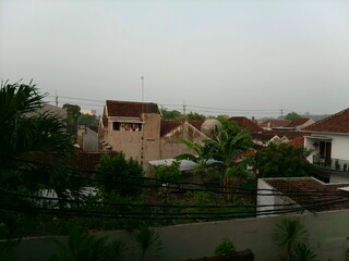 Cloudy atmosphere in a settlement in Jember, East Java
