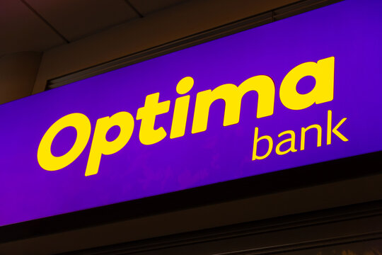 Signage and logo of Optima Bank in Athens, Greece