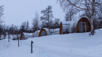 holiday homes in the snow at Christmastime
