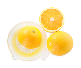 Glass juicer and oranges isolated on white, top view