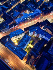 Fototapeta premium High Angle View of Illuminated Historical Central Leicester City of England UK at Night. Aerial Footage Was Captured with Drone's Camera During Midnight of April 26th, 2024 from Medium High Altitude.