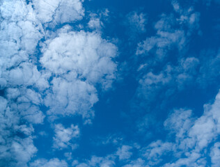 White clouds on blue sky background