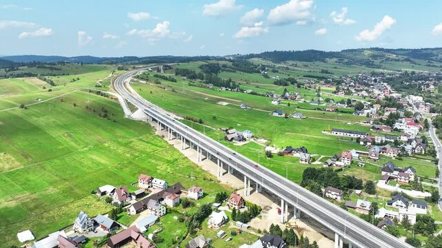 New viaduct on last fragment of Zakopianka motorway in Poland over Klikuszowa village, main place of traffic jams.  fragment of highway from Rdzawka to Nowy Targ opened for traffic in September 2024