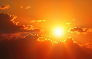 Fototapeta premium Bright sun shines. Orange sky glows. Clouds burn gold. Summer heatwave. Global warming. Climate change. Energy. Power. Sunshine. Sunlight. Warm weather. Hot summer day. Dramatic sky. Wallpaper